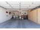 Spacious garage with ample storage, built-in cabinets, and overhead lighting at 276 E Senna Way, San Tan Valley, AZ 85143