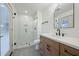 Bathroom featuring a glass enclosed shower, modern fixtures, and updated finishes at 2901 E Cortez St, Phoenix, AZ 85028