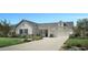 New construction farmhouse with white siding, gray roof, and a two-car garage at 3294 W Storm Cloud St, San Tan Valley, AZ 85144