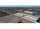 Wide aerial shot featuring a storage facility, commercial area, and surrounding residential neighborhoods at 4100 S Pinelake Way # 143, Chandler, AZ 85249