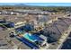 Beautiful aerial view of the community showcasing the pool, landscaping, and surrounding neighborhood at 4100 S Pinelake Way # 143, Chandler, AZ 85249