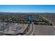 Expansive aerial view showcasing the residential community with a lake, roads, and natural desert beauty at 4100 S Pinelake Way # 143, Chandler, AZ 85249