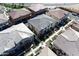 Aerial view of home in a charming neighborhood with manicured lawns and tile roofs at 4100 S Pinelake Way # 143, Chandler, AZ 85249