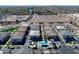 Beautiful aerial view of a well-maintained community with a pool and convenient access to city amenities at 4100 S Pinelake Way # 143, Chandler, AZ 85249