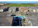 High angle view showcasing the community pool, surrounding residences, and neatly arranged streetscape at 4100 S Pinelake Way # 143, Chandler, AZ 85249
