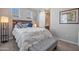 Bedroom featuring a modern design with a sliding barn door at 4100 S Pinelake Way # 143, Chandler, AZ 85249