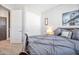 Bedroom featuring a bed, large window, closet and gray walls at 4100 S Pinelake Way # 143, Chandler, AZ 85249