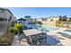 Inviting outdoor dining area by the community pool, perfect for gatherings and relaxation at 4100 S Pinelake Way # 143, Chandler, AZ 85249