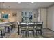 Bright dining area with convenient access to the kitchen bar, perfect for entertaining at 4100 S Pinelake Way # 143, Chandler, AZ 85249