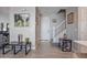 Inviting foyer with sleek console tables and a view of the staircase at 4100 S Pinelake Way # 143, Chandler, AZ 85249