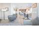 Open-concept living area seamlessly connects the living room, dining area, and kitchen with stylish decor at 4100 S Pinelake Way # 143, Chandler, AZ 85249