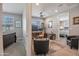 Open office space with a ceiling fan and a view into the guest bedroom at 4100 S Pinelake Way # 143, Chandler, AZ 85249
