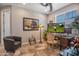 Cozy office space with desk, chair, and large window at 4100 S Pinelake Way # 143, Chandler, AZ 85249