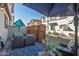 Charming patio setup with wicker furniture and stylish outdoor decor at 4100 S Pinelake Way # 143, Chandler, AZ 85249