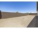 This backyard is enclosed by a block wall and has desert landscaping at 4210 E Desert Vista Trl, Cave Creek, AZ 85331