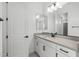 Bathroom vanity with white cabinets, gray countertop, and a black faucet at 4210 E Desert Vista Trl, Cave Creek, AZ 85331