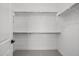 Large walk-in closet featuring gray carpet, white walls, and metal hanging rods at 4210 E Desert Vista Trl, Cave Creek, AZ 85331