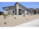 Inviting single-Gathering home featuring desert landscaping, gray exterior, and drought tolerant vegetation at 4210 E Desert Vista Trl, Cave Creek, AZ 85331
