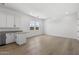 Bright kitchen featuring stainless steel appliances, hardwood flooring, and shaker cabinets at 4210 E Desert Vista Trl, Cave Creek, AZ 85331