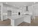 Spacious gourmet kitchen with island, quartz countertops, and stainless steel appliances at 4210 E Desert Vista Trl, Cave Creek, AZ 85331