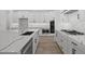 Gourmet kitchen featuring stainless steel appliances, quartz countertops, and island with sink at 4210 E Desert Vista Trl, Cave Creek, AZ 85331