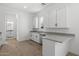 Modern kitchen featuring stainless steel appliances, shaker cabinets, and hardwood flooring at 4210 E Desert Vista Trl, Cave Creek, AZ 85331