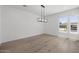 Bright living room featuring hardwood floors, recessed lighting, and large windows at 4210 E Desert Vista Trl, Cave Creek, AZ 85331