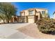 Charming two-story home featuring a three car garage and low-maintenance desert landscaping at 43608 W Kristal Ln, Maricopa, AZ 85138