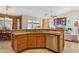 Open kitchen featuring granite countertops, stainless steel appliances, and seamless flow into the living area at 43638 N 22Nd St, New River, AZ 85087