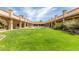 Beautiful courtyard with fountain, grass, and walkways at 54 Leisure World --, Mesa, AZ 85206