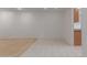 Spacious living area with carpet and tile flooring, transitioning towards kitchen at 54 Leisure World --, Mesa, AZ 85206
