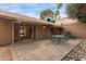 Outdoor patio with views into the interior, with a retractable awning and outdoor seating at 54 Leisure World --, Mesa, AZ 85206