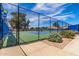 Exterior shot of a tennis court with signage and landscaping at 54 Leisure World --, Mesa, AZ 85206
