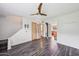 Bright living room boasts modern flooring, natural wood doors, and abundant natural light, creating a welcoming space at 6169 N Granite Reef Rd, Scottsdale, AZ 85250