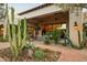Outdoor living space with desert plants and a covered patio at 6640 E Kasba Cir, Paradise Valley, AZ 85253