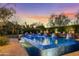 Stunning pool with water features and lush landscaping, perfect for relaxation and entertaining at 6640 E Kasba Cir, Paradise Valley, AZ 85253