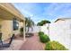Cozy backyard retreat with a covered patio, desert landscaping and privacy fence at 6730 E Hermosa Vista Dr # 20, Mesa, AZ 85215