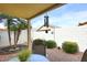 Peaceful backyard features desert landscaping, providing a serene outdoor living space at 6730 E Hermosa Vista Dr # 20, Mesa, AZ 85215