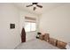 Cozy room with neutral walls, blinds on window for natural light, and carpeted floors, ready for personal touches at 6730 E Hermosa Vista Dr # 20, Mesa, AZ 85215