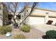 Charming single-story home featuring a two-car garage and desert landscaping in a well-maintained community at 6730 E Hermosa Vista Dr # 20, Mesa, AZ 85215