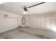 Spacious garage with ample storage cabinets and easy access, making organization a breeze at 6730 E Hermosa Vista Dr # 20, Mesa, AZ 85215