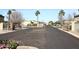 Private community entrance secured by gate, providing residents added security and peace of mind at 6730 E Hermosa Vista Dr # 20, Mesa, AZ 85215