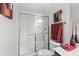 Modern bathroom with glass-enclosed shower, white tile, and neutral wall colors at 7009 E Acoma Dr # 1113, Scottsdale, AZ 85254