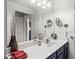Bathroom vanity with solid surface countertop, modern faucet, and stylish decor at 7009 E Acoma Dr # 1113, Scottsdale, AZ 85254