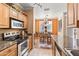Charming kitchen with modern appliances that overlooks the dining area, perfect for entertaining at 7009 E Acoma Dr # 1113, Scottsdale, AZ 85254