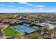 Aerial view of outdoor tennis and pickleball courts nestled within a desert community at 7370 E Sunset Sky Cir, Scottsdale, AZ 85266