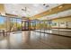 Spacious dance studio with hardwood floors, mirrors, and ballet barres at 7370 E Sunset Sky Cir, Scottsdale, AZ 85266