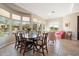 Open living space featuring a dining table, comfortable seating, and an abundance of natural light at 7370 E Sunset Sky Cir, Scottsdale, AZ 85266