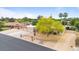 Aerial view of a desert home featuring mature trees and landscaping at 7820 S Maple Ave, Tempe, AZ 85284