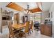 Comfortable dining room featuring wood paneling, and a large table to seat the entire Gathering at 7820 S Maple Ave, Tempe, AZ 85284